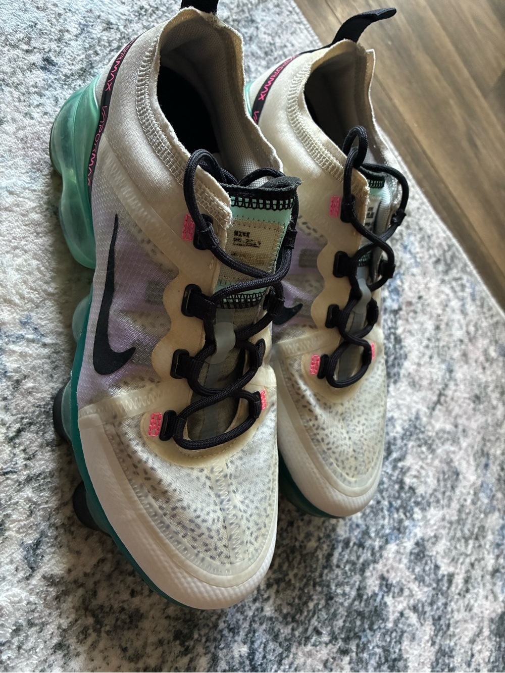 Nike Women’s White Sneakers with Teal Sole and Black Accents